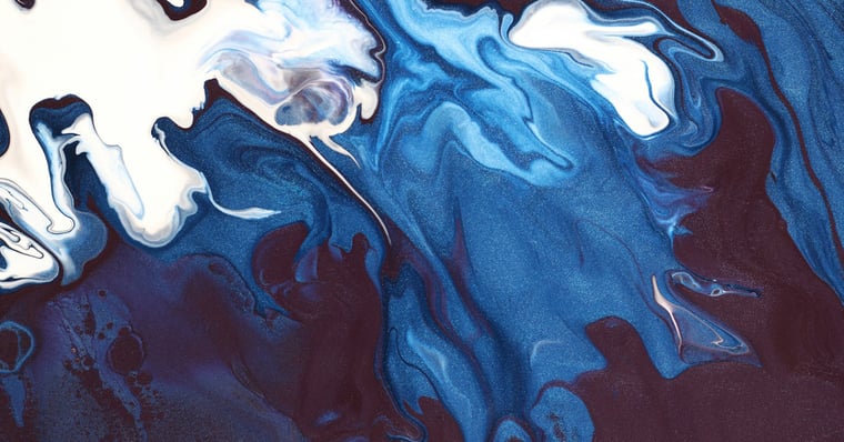 A zoomed in photo of an acrylic pour painting.